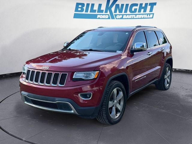 2015 Jeep Grand Cherokee Limited in Deep Cherry Red Crystal Pearlcoat — front three-quarter view