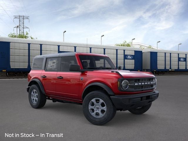 2026 Ford Bronco Big Bend in Ruby Red Metallic Tinted Clearcoat — front three-quarter view