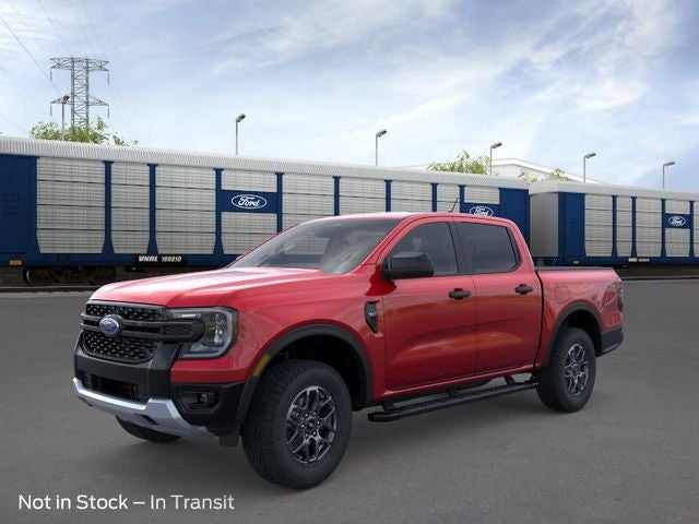 2026 Ford Ranger XLT in Ruby Red Metallic Tinted Clearcoat — front three-quarter view