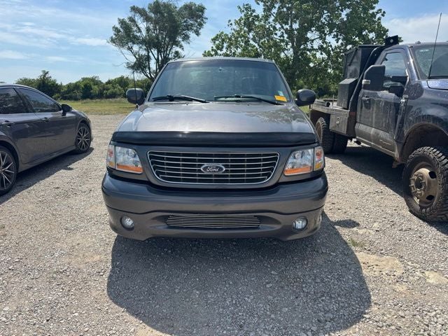 2002 Ford F-150 Harley-Davidson in Black — front three-quarter view
