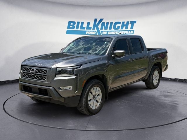 2022 Nissan Frontier SV in Gun Metallic — front three-quarter view
